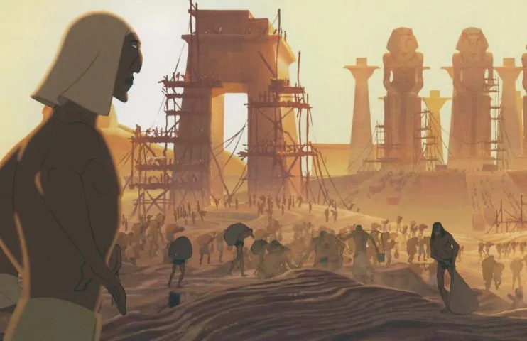 fotograma de pelicula el principe de egipto, trabajadores construyendo edificaciones en el desierto